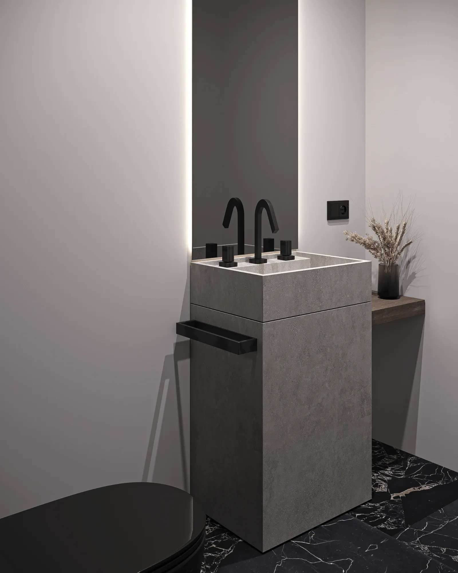 Cloakroom with a freestanding cast-concrete basin, full-height backlit mirror, matt black brassware and a black marble floor.
